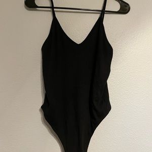 Soft textured thong body suit